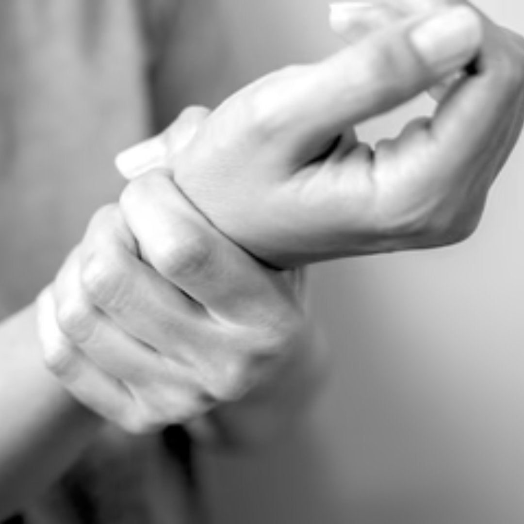 hand clutching wrist - Sore, Swollen hand & wrists - TheRY